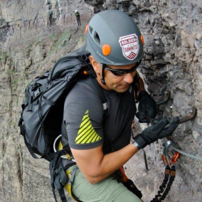 Image of Ivan rock climbing